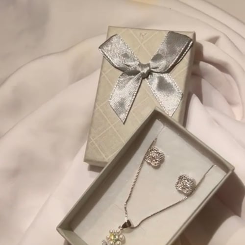 Silver necklace and earring set