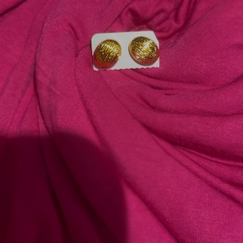 Gold stud earrings