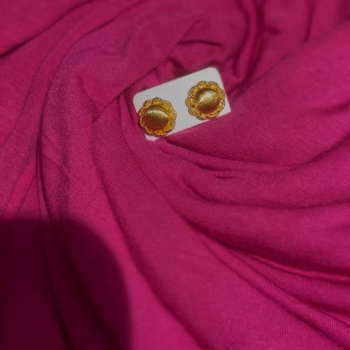 Gold stud earrings