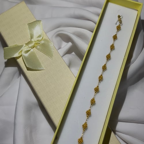 Gold bracelet in gift box